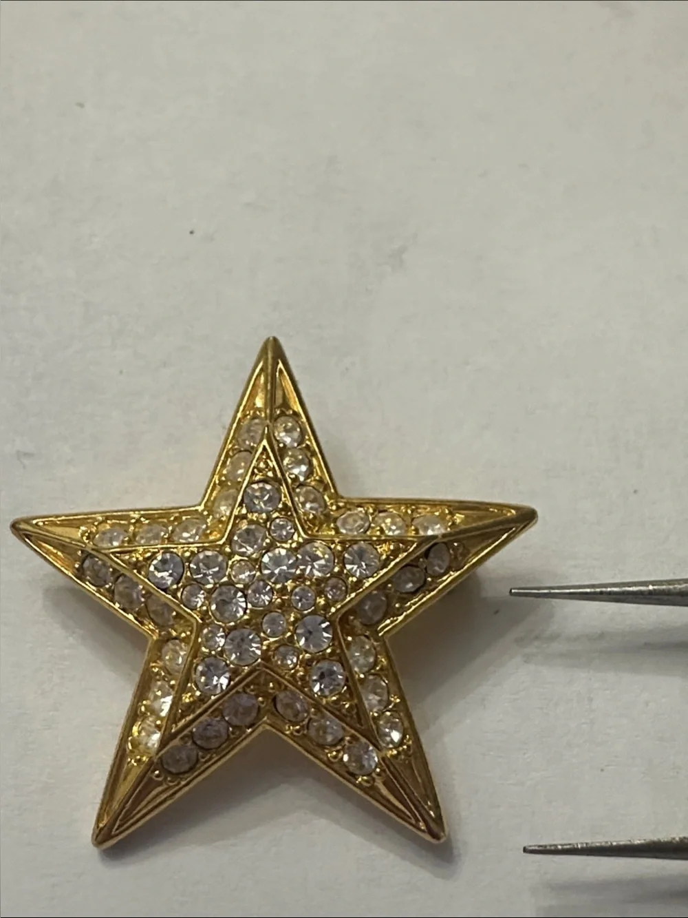 Joan Rivers Gold Star Brooch with Clear Crystals